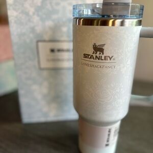 White Floral Tumbler with Blue Lid